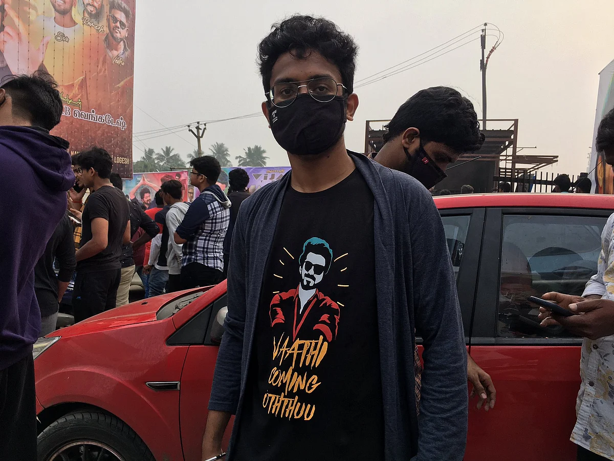 A resident of Chennai gets ready to watch Master.