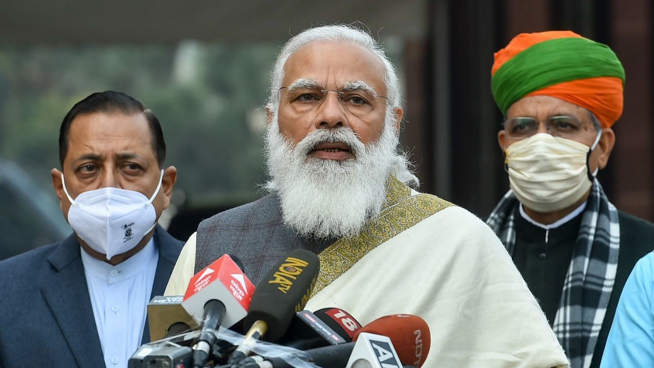 Prime Minister Narendra Modi addresses the media at Parliament House as he arrives to attend the Budget Session, in New Delhi.
