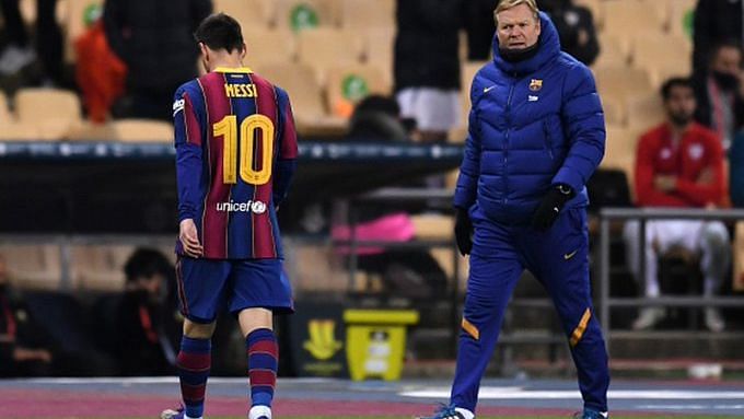 Lionel Messi walks past Ronald Koeman after getting a red card against Athletic Bilbao