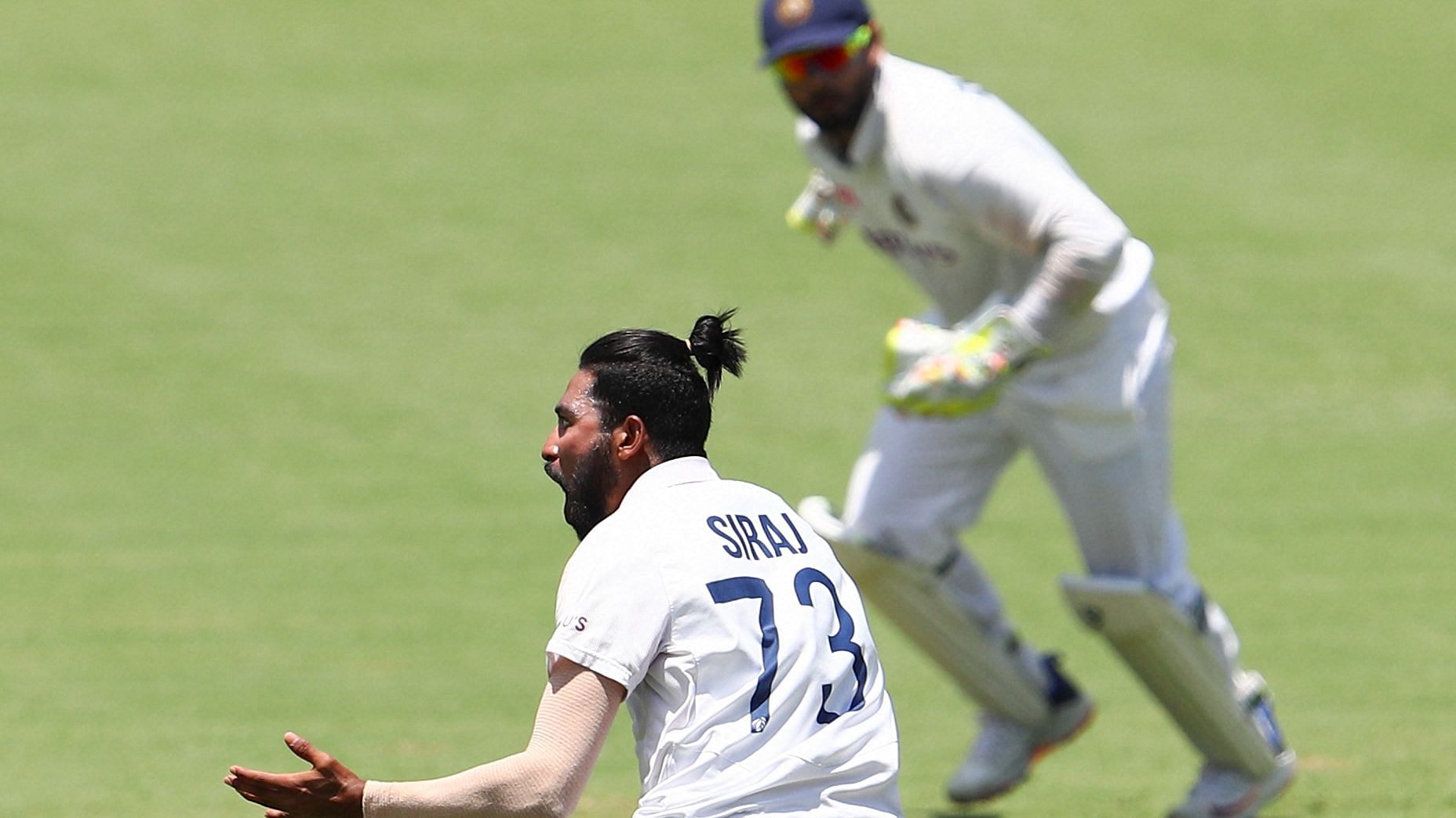 Mohammed Siraj celebrates a wicket on Day 4 at the Gabba.&nbsp;