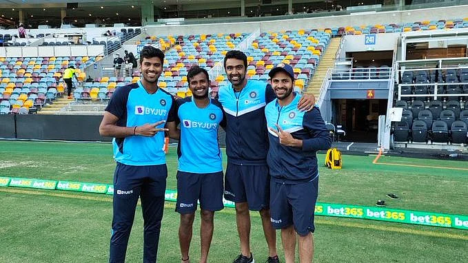 T Natarajan with R Ashwin, Washington Sundar and Shardul Thakur pose for a picture at the Gabba.