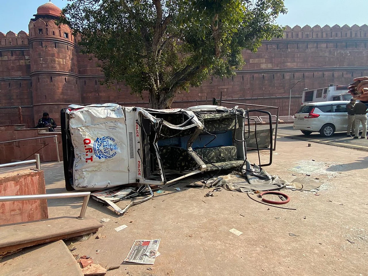 An upturned vehicle at the Red Fort complex.