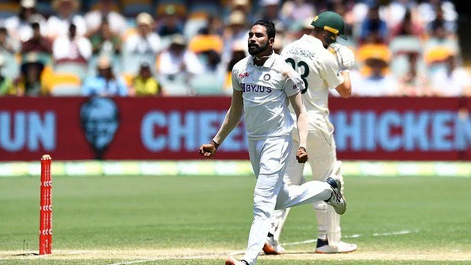 Mohammed Siraj celebrates the wicket of Marnus Labuschagne at the Gabba. 
