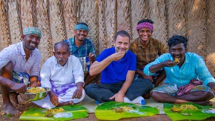 Rahul Gandhi with people from the “Village Cooking Show.”