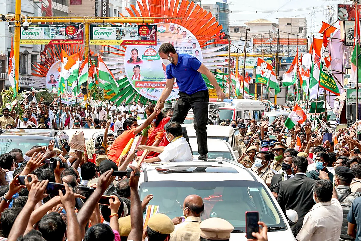 Congress leader Rahul Gandhi greets a young supporter during an election campaign rally ahead of Tamil Nadu assembly polls, in Karur district, Monday, 25 January 2021.