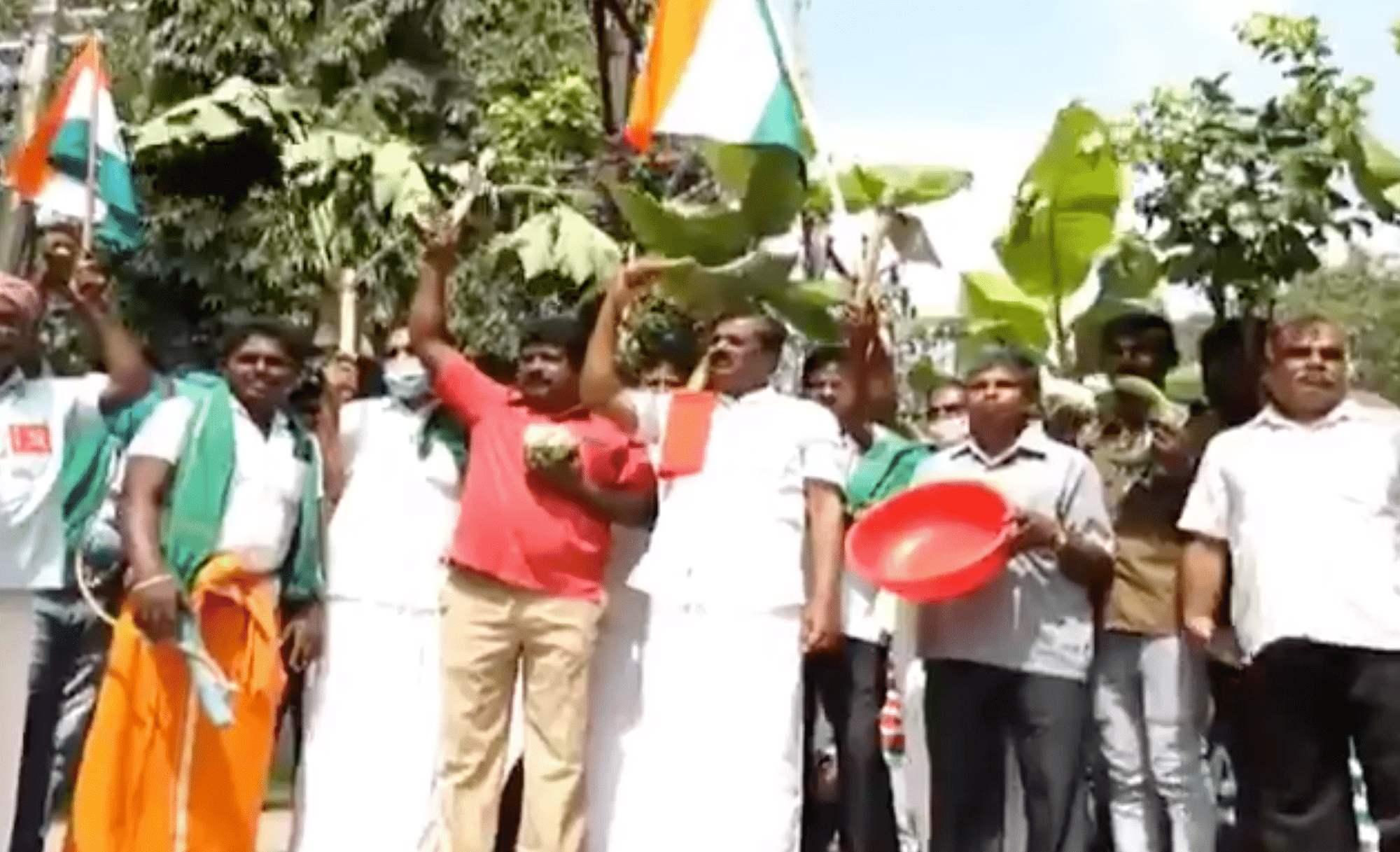 Farmers in Coimbatore stage protest against the farm laws.