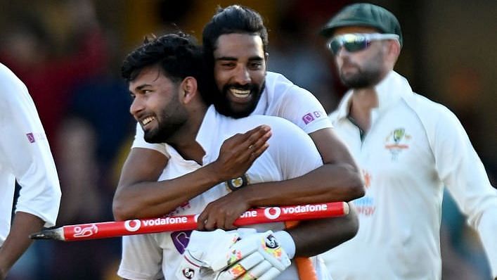 Rishabh Pant and Mohammed Siraj celebrate the Test series win against Australia