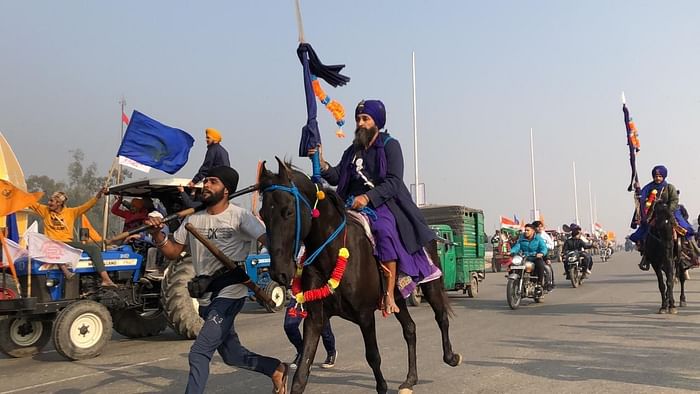Nihang Sikhs, Clad in Blue, Give Escort on Horses to Tractor Rally