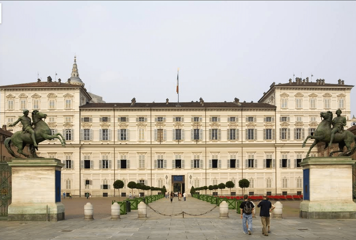 The man is standing at the Piazza Castello in Italy’s Turin,  surrounded by state-owned historical buildings.
