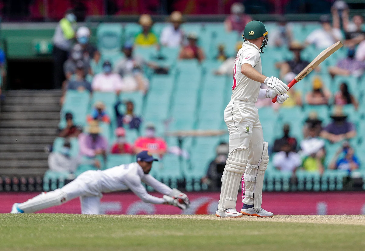 Indian wicketkeeper Wriddhiman Saha takes the catch to dismiss Australia’s Marnus Labuschagne.