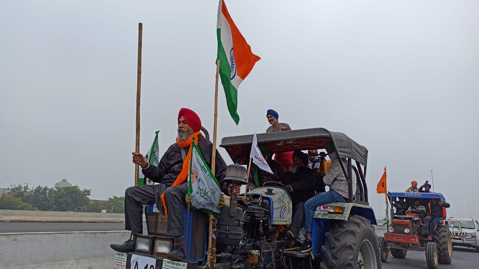 Farmers during an earlier tractor rally as part of their protest against the farm laws.