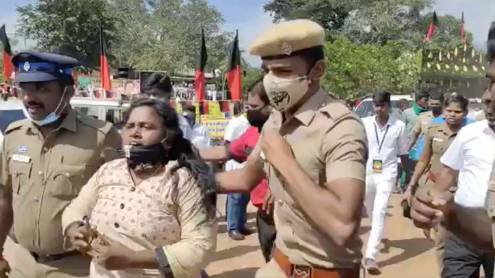 An AIADMK woman functionary was manhandled by DMK cadre for questioning DMK chief Stalin during a grama sabha meeting at Devarayapuram in Thondamuthur on Saturday.