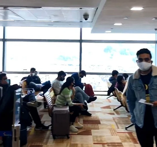 UK passengers waiting at the Airport Lounge.