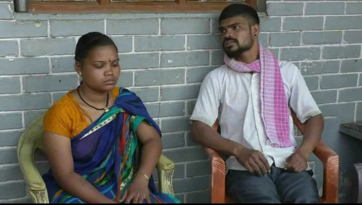 While Behere entertains questions from the media, his wife Geeta does not utter a word.