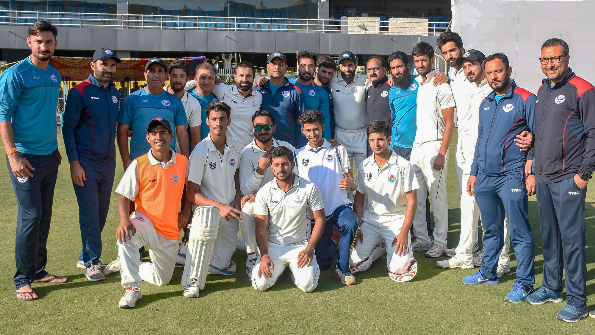 Players and officials of Jammu and Kashmir Ranji team pose for a photograph after winning the match against Assam in Guwahati on 1 January 2019.