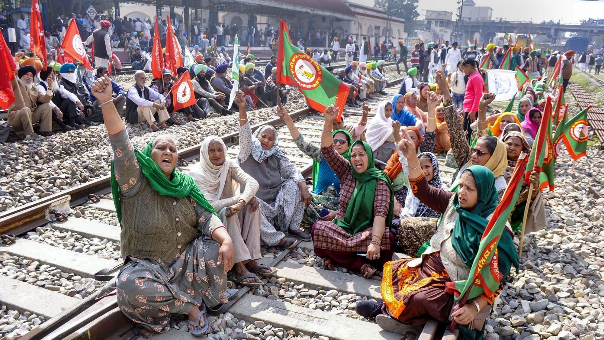 Members of various farmer organisations block a railway track in Patiala during a four-hour rail roko demonstration across the country, called by Samyukta Kisan Morcha (SKM), as part of their agitation against Centre’s farm reform laws.