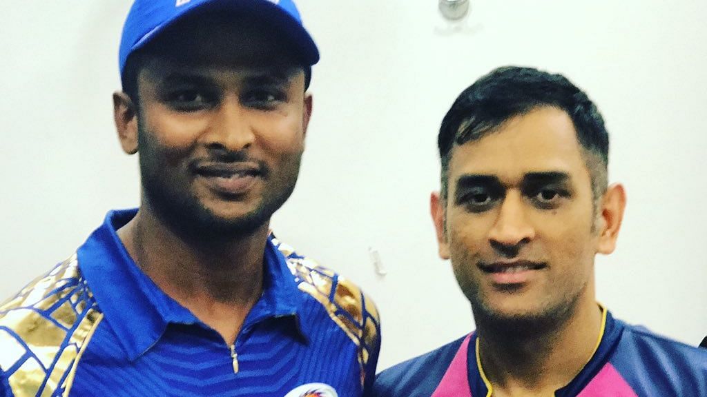 K Gowtham and MS Dhoni.&nbsp;