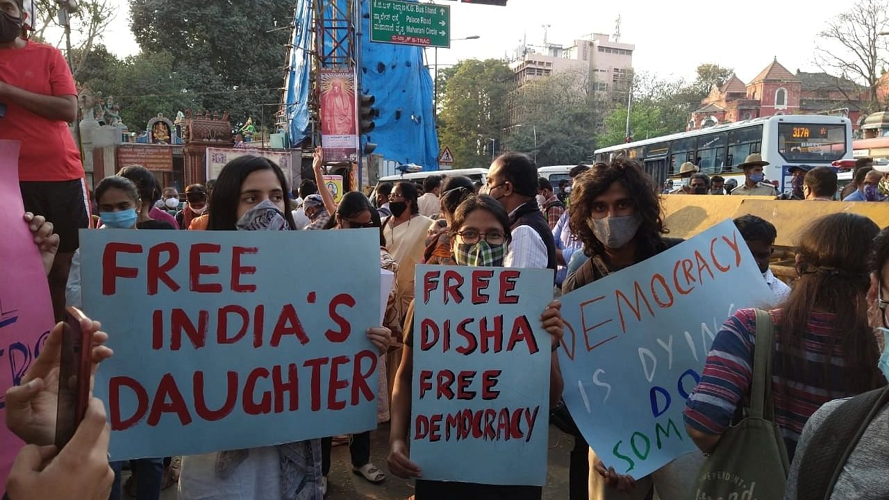 Young people carry placards in solidarity with Disha Ravi, in Bengaluru.