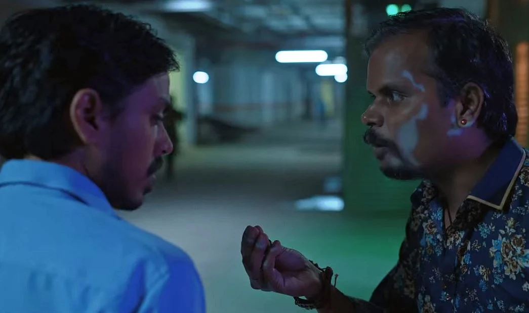 Nalneesh with Adarsh Gourav in a still from <i>The White Tiger</i>.