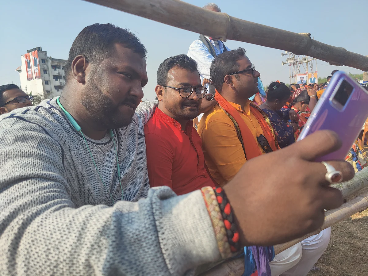 Sudip Prasad (grey shirt) takes a selfie with the other supporters of Krishna Prasad.