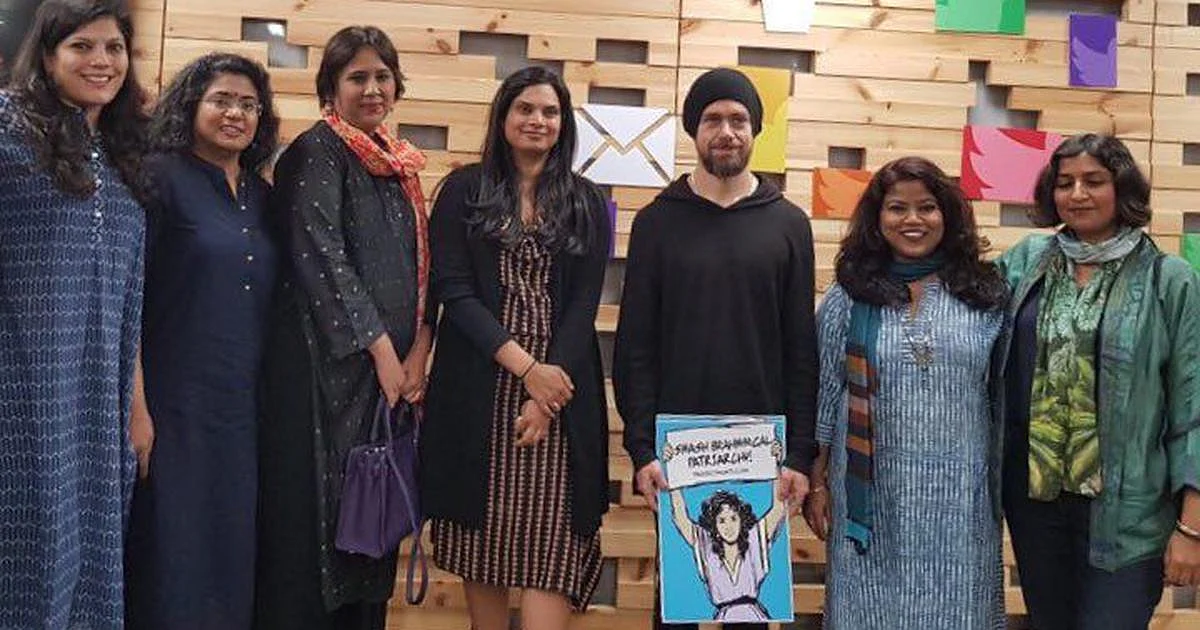 Twitter CEO Jack Dorsey holding a poster that reads ‘Smash Brahminical Patriarchy’