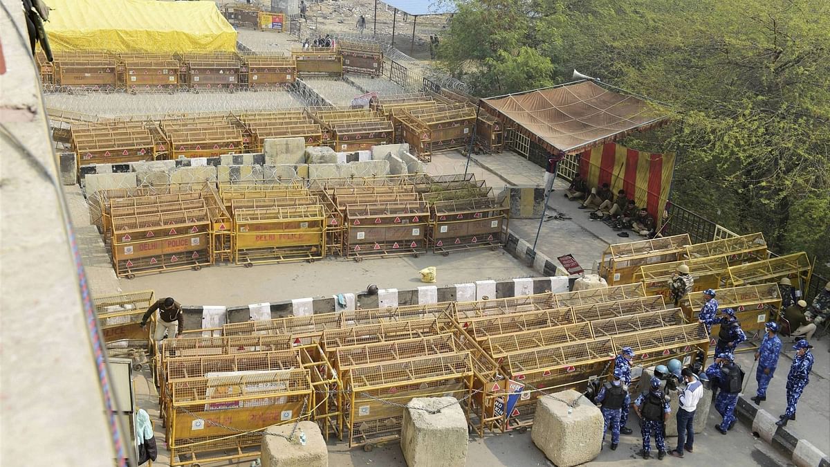 Barricading at Ghazipur border to stop farmers from marching towards the national capital, during their ongoing agitation against Centres farm reform laws, in New Delhi on Monday.