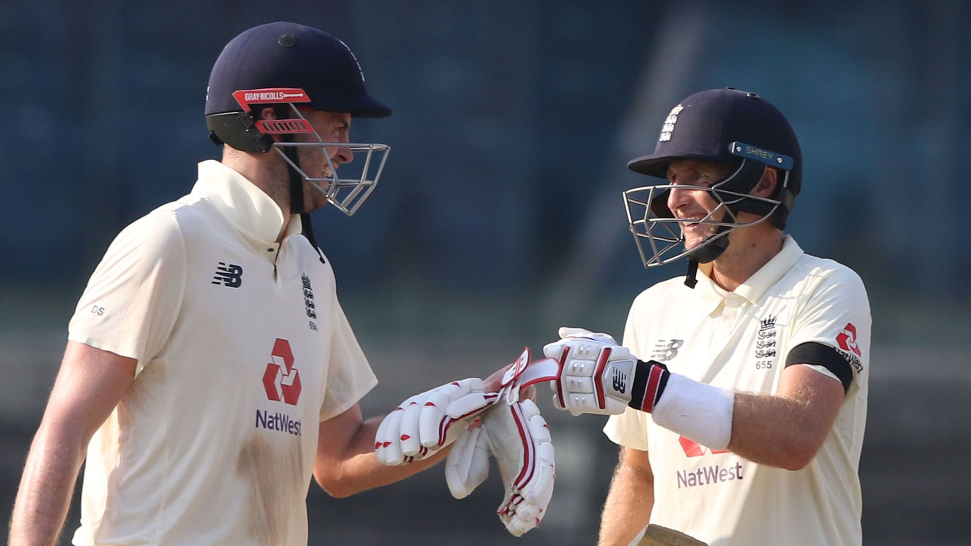 Joe Root (captain) of England and Dom Sibley of England during day one of the first test match between India and England held at the Chidambaram Stadium stadium in Chennai.