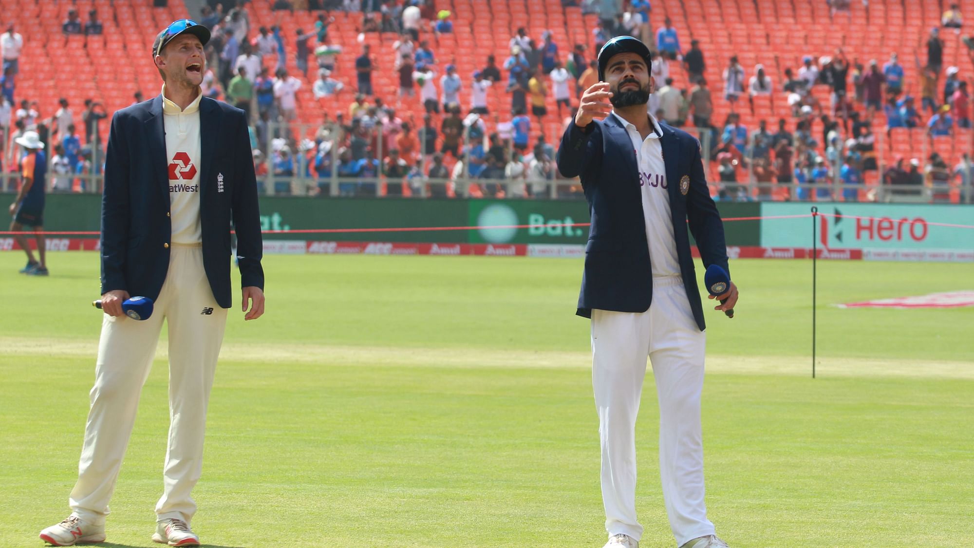 Joe Root and Virat Kohli at the toss in Ahmedabad