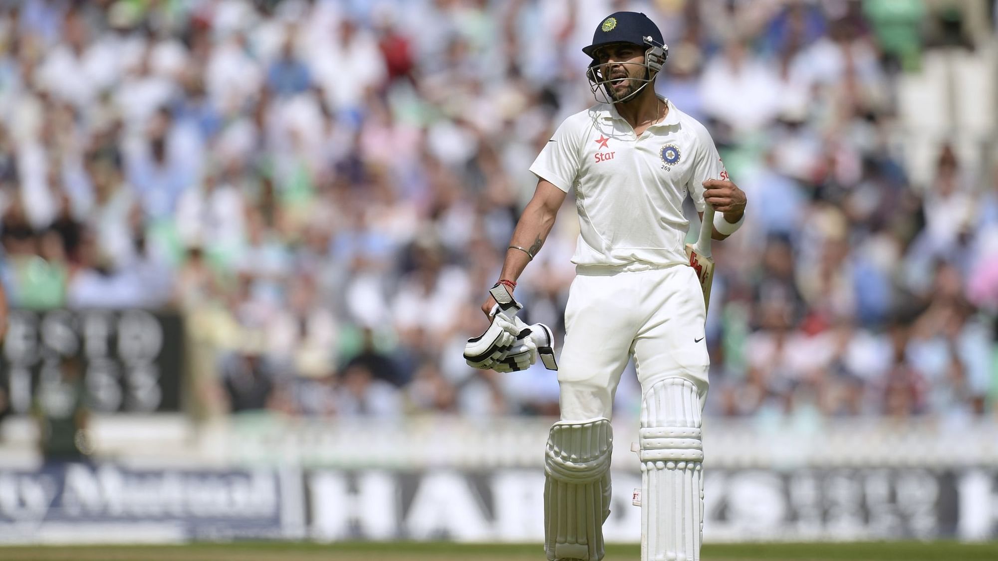 India’s Virat Kohli leaves the field after being dismissed during the fifth Test against England at the Oval in 2014.