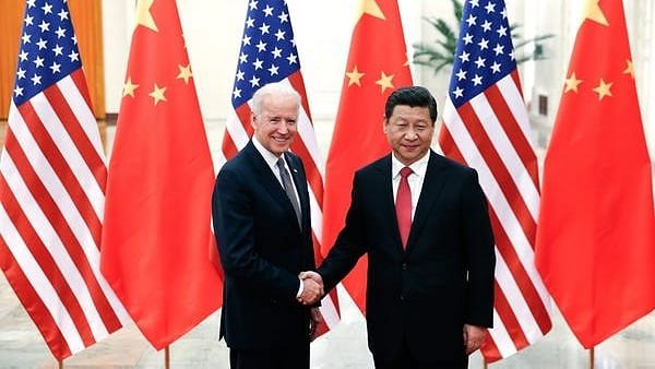 <div class="paragraphs"><p>Then-Vice President Biden meeting Chinese leader Xi Jinping in 2013.</p></div>