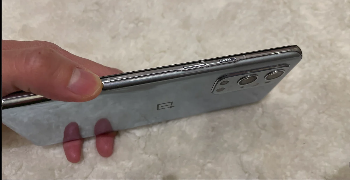OnePlus 9 Pro has a thin profile and buttons are larger than previous models.