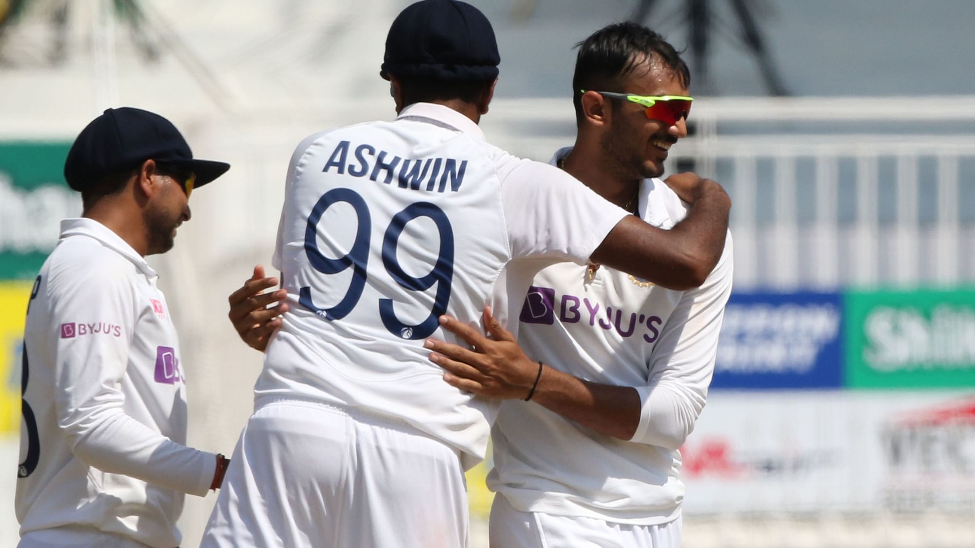 Axar Patel, R Ashwin and Kuldeep Yadav celebrate a wicket.&nbsp;