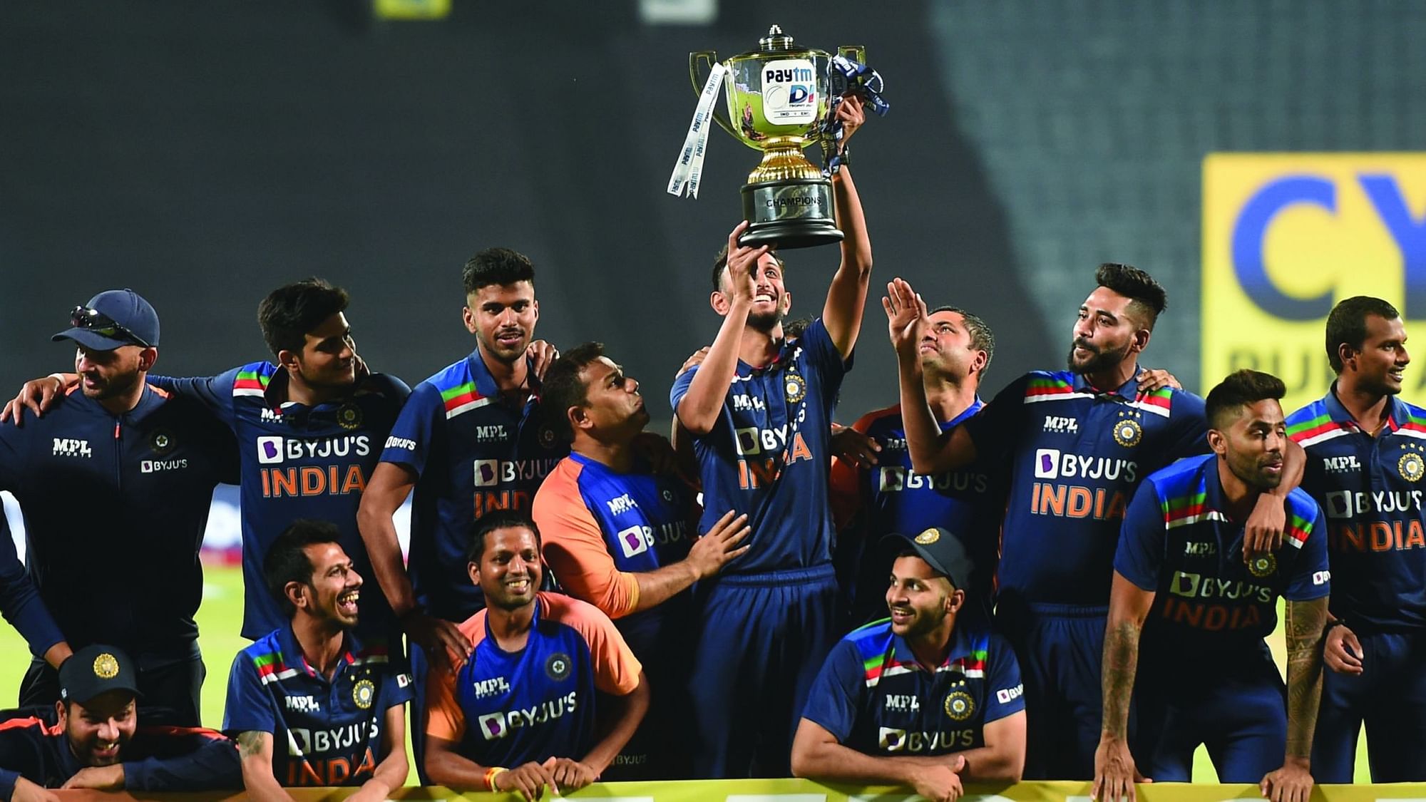 Indian team poses with the trophy after winning the ODI series against England, at Maharashtra Cricket Association Stadium in Pune, Sunday, March 28, 2021.&nbsp;