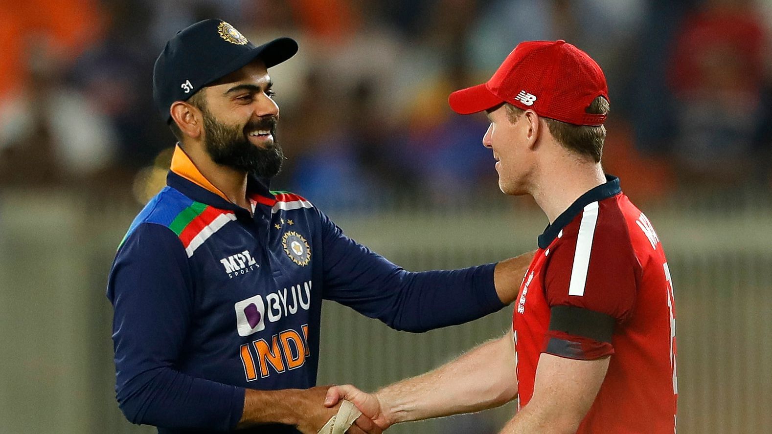 Virat Kohli(Captain) of India and Eoin Morgan (Captain) of England players doing handshakes after the match during the 1st T20 International between India and England held at the Narendra Modi Stadium, Ahmedabad, Gujarat, India on the 12th March 2021