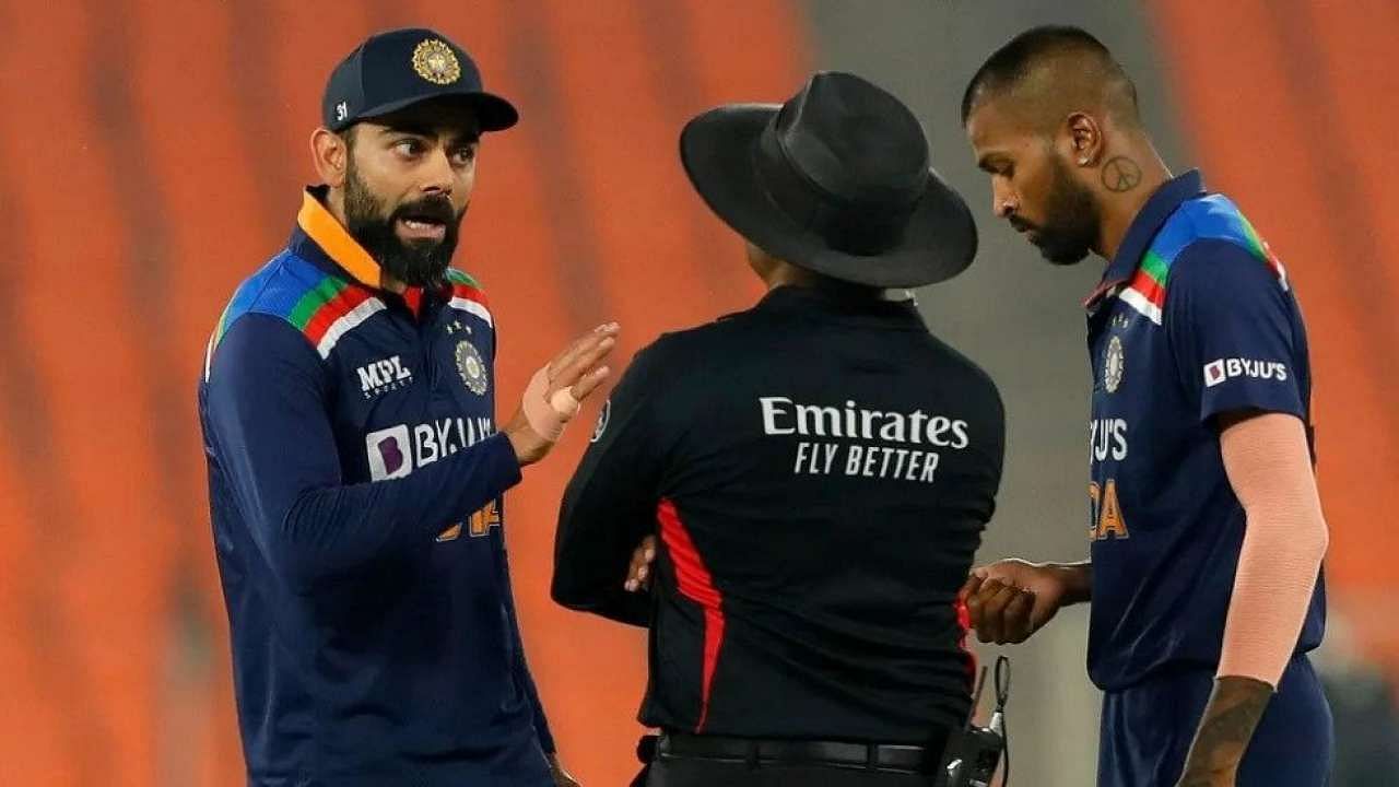 Virar Kohli speaking with the umpire during the T20I series against England.