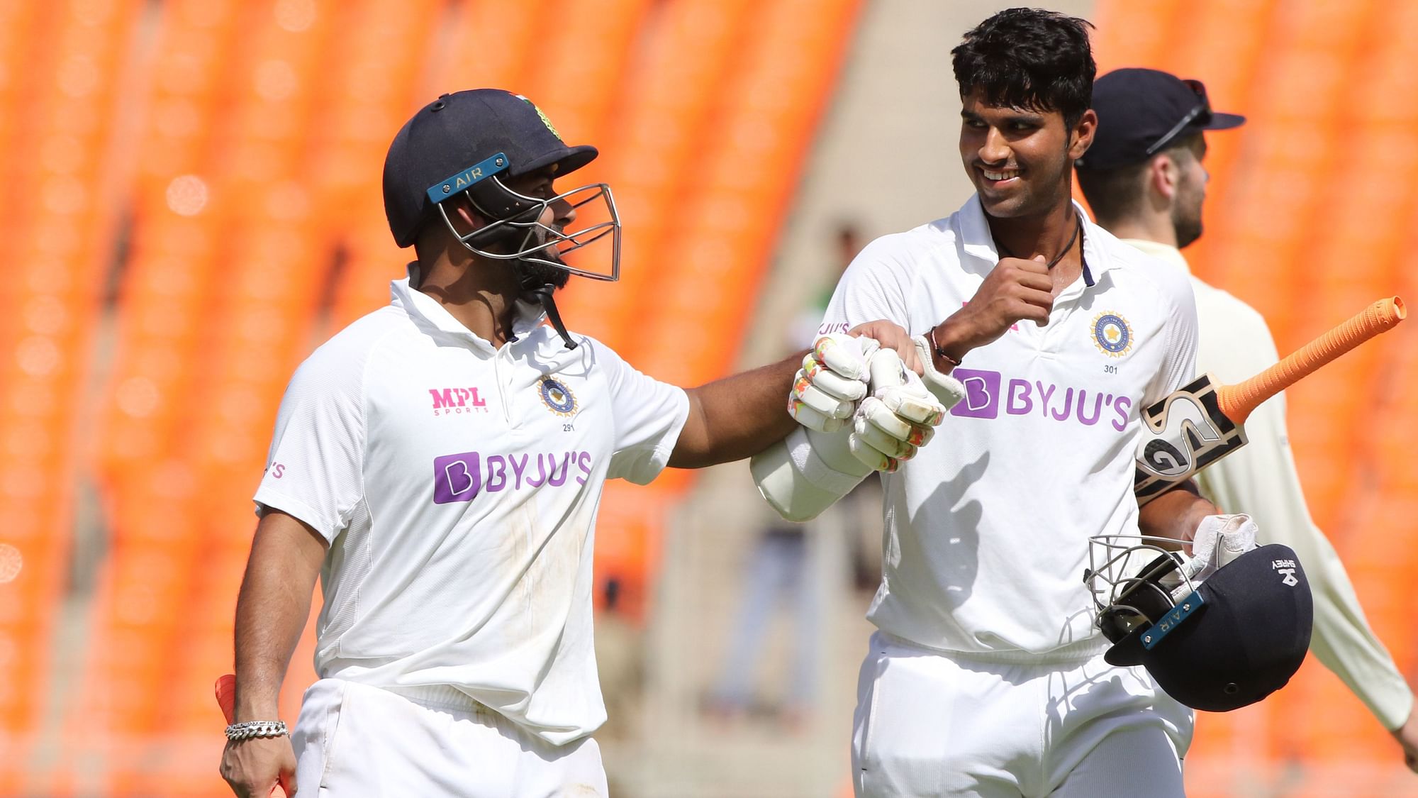 Rishabh Pant and Washington Sundar share a light moment during their partnership on Day 2 of the fourth Test against England.