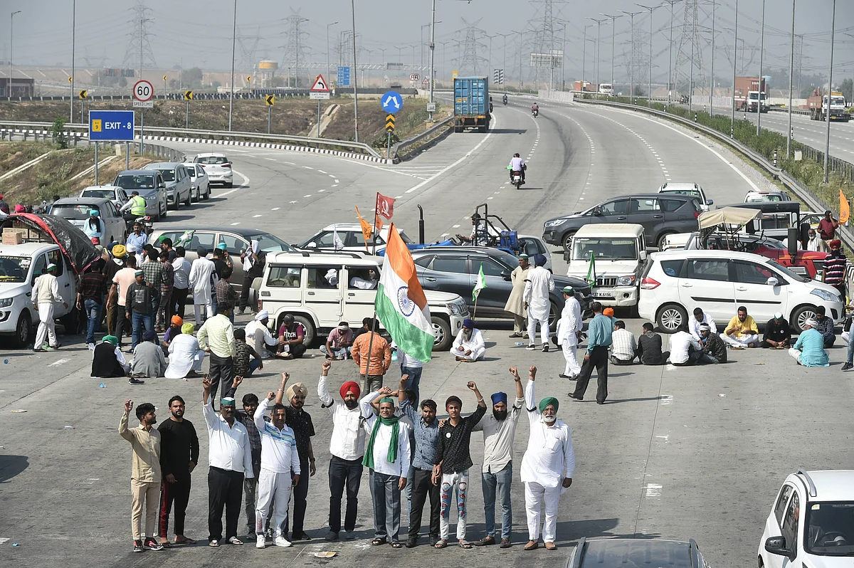 Farmers block the KMP Expressway near Duhai to mark the 100th day of their ongoing agitation against Centres farm reform laws, in Ghaziabad.