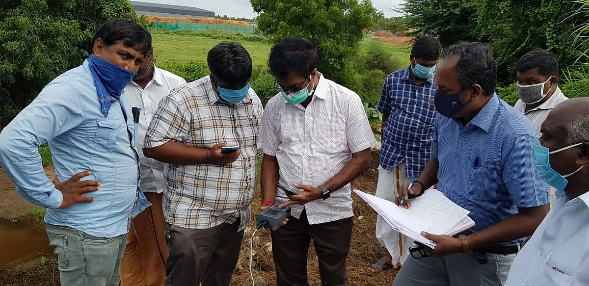 Raj along with activists and officials try to ascertain the contamination levels of the groundwater.