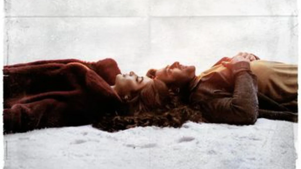 Prabhas and Pooja in the poster for 'Radhe Shyam'