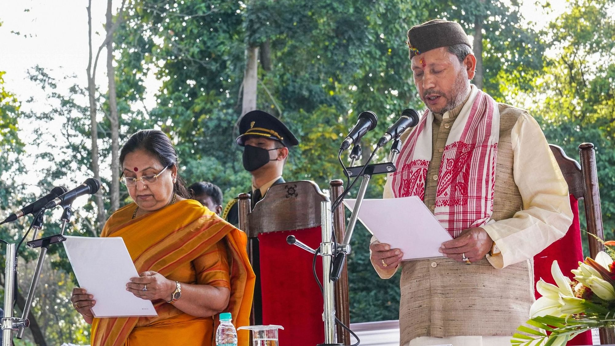 Uttarakhand Governor Baby Rani Maurya administers the oath to Tirath Singh Rawat as the new Chief Minister of Uttarakhand.