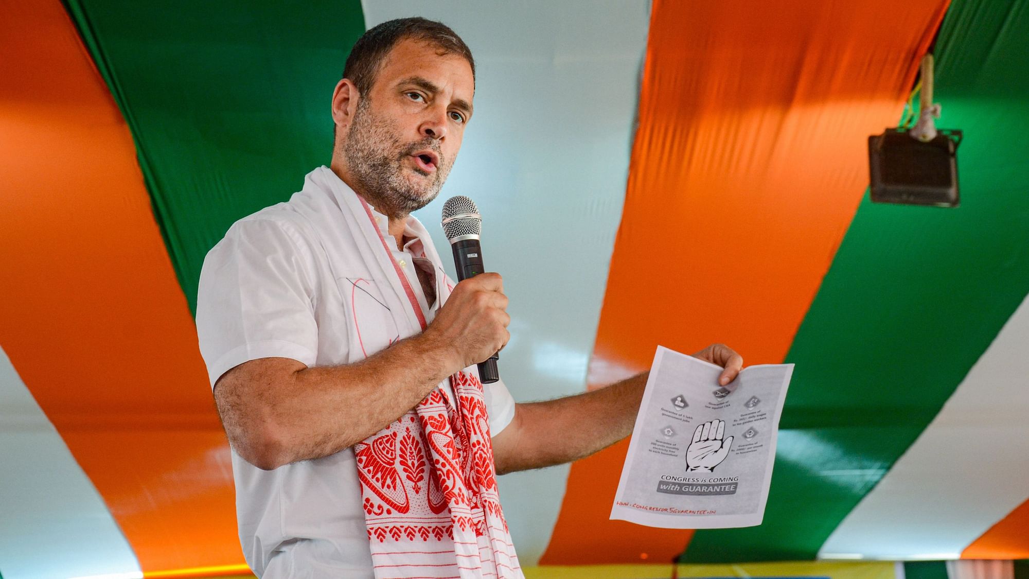Congress leader Rahul Gandhi addresses students during an interactive session at Lahowal college, in Dibrugarh on 19 March.