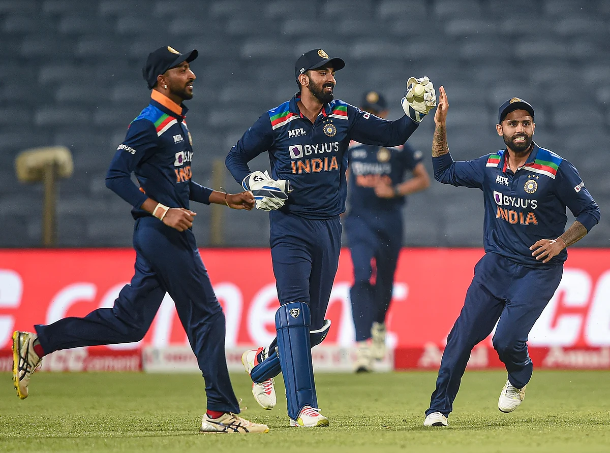 Pune: Indian cricketer Krunal Pandya, KL Rahul and Suryakumar Yadav celebrates the wicket of England cricketer Moeen Ali during the first One Day International cricket match between India and England.