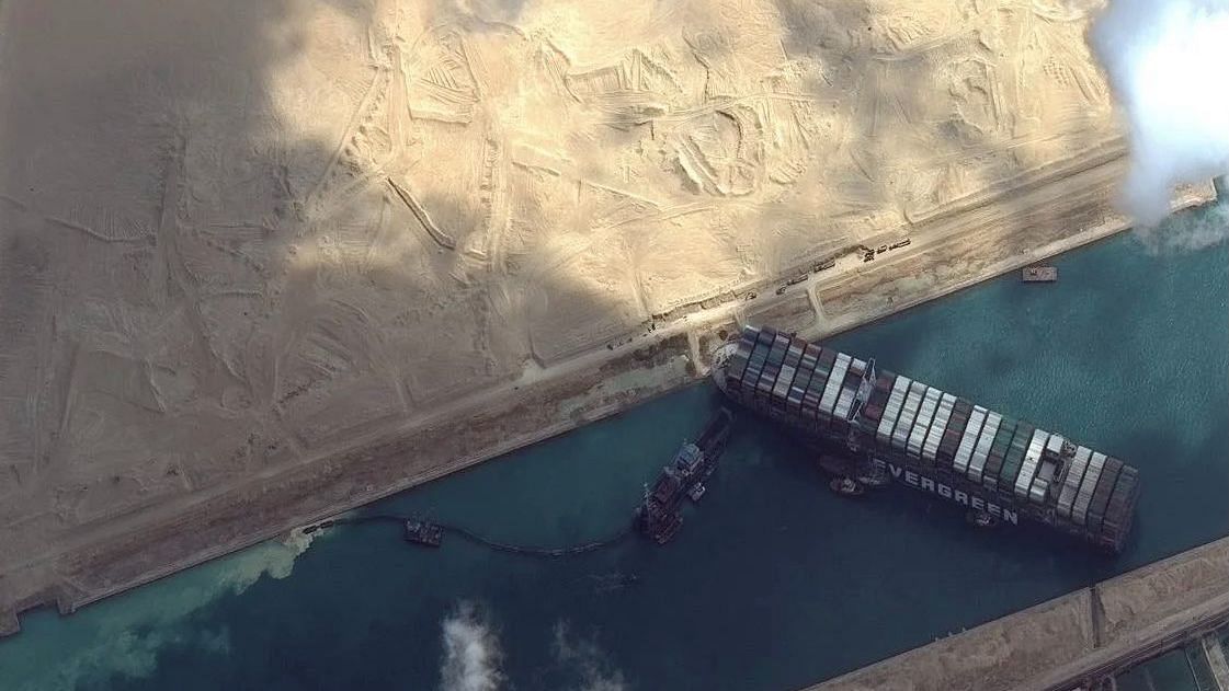 A cargo container ship that’s among the largest in the world had turned sideways and blocked all traffic in Egypt’s Suez Canal.