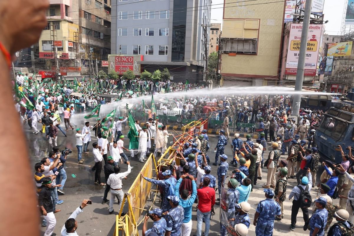 Stones were reportedly pelted by RJD workers outside the Bihar Assembly, and the police unleashed water canons on them.