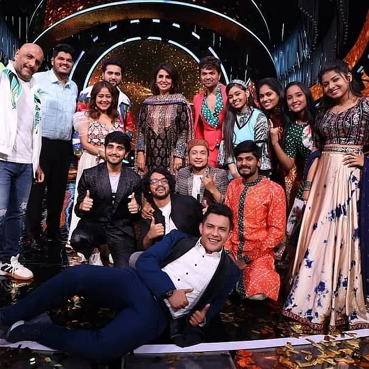 <div class="paragraphs"><p>One with the contestants.</p></div>