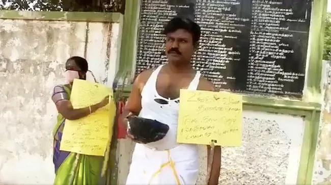 The independent candidate with his placard and begging bowl.