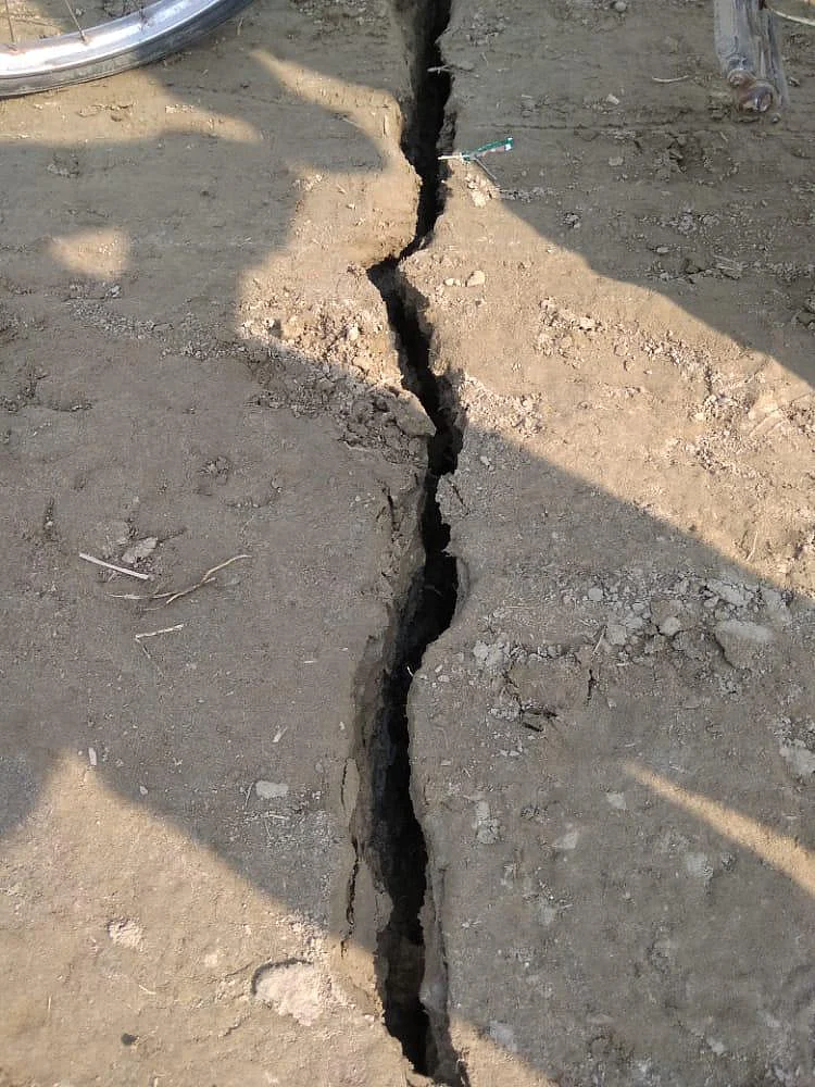 A crack in the ground caused by the earthquake.
