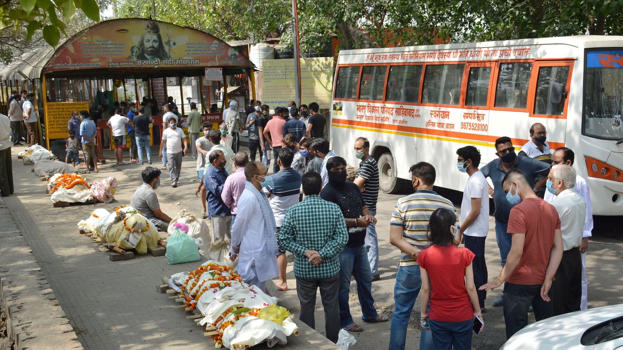 Bodies lined up for cremation, amid surge in COVID-19 cases across country, at Hindon river crematorium in Ghaziabad, Friday, 16 April, 2021.&nbsp;