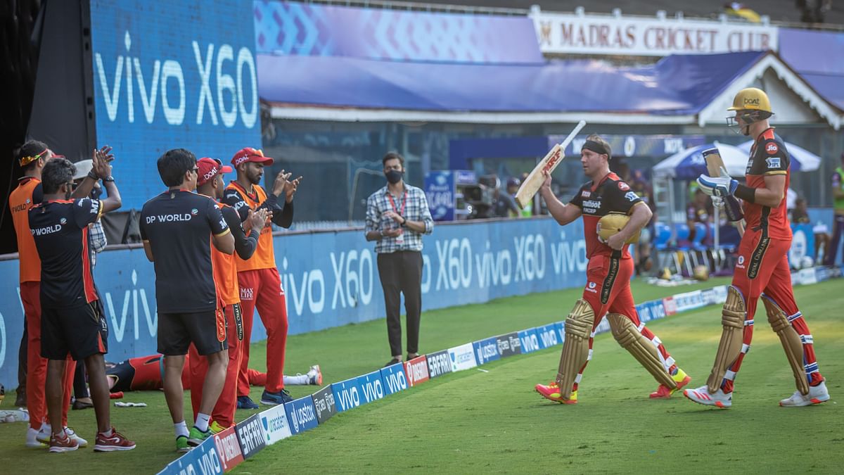 Virat Kohli finally won a toss against Eoin Morgan and opted to bat in the first day game of IPL 2021 in Chennai.  
