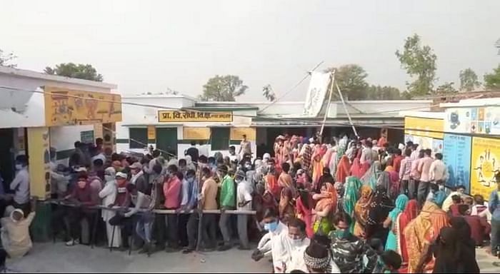 Bareilly voters stand in snugly-packed queues as the second wave of the pandemic surges.